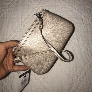 Wilson’s leather gold wristlet